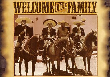 Vintage sepia photo of horsemen in sombreros under the words Welcome to the Family